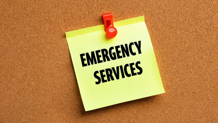 Wall Mural - Emergency Services word written on a note sticky on corkboard