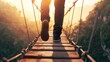 © TGIF - Person stepping onto bridge symbolizing fresh start and new adventure.