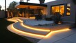 © SmartArt - Sleek LED strip lighting enhances a modern patio and garden walkway at twilight