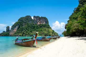 Long tail boat on the tropical beach in thailand