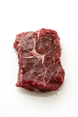 Wall Mural - Close-up shot of raw steak on a white surface, ideal for food-related content and illustrations