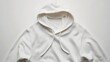 © Sasa Visual - A simple, blank hoodie mockup lies flat against a white background, ideal for showcasing designs