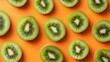 © cac_tus - Sliced kiwi fruits arranged on vibrant orange background, geometric pattern. Freshness and health concept