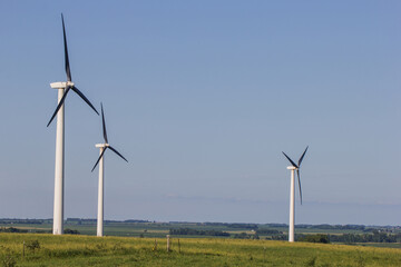 group of three wind turbines