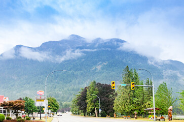 Cloud covered green mountains