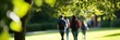 © gunzexx png and bg - A group of students with backpacks walking together on a lush green campus, symbolizing education, friendship, growth, and the beautiful environment of academic life.
