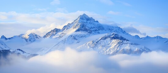 Canvas Print - Snow-capped Mountain Peak Emerging From Clouds