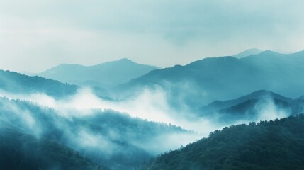 A close-up of misty mountain terrain with diffused light and gentle fog