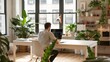 © Pojjanee - A high-resolution photo of a young entrepreneur working in a stylish, clean office space, soft natural light