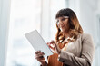 © Malambo/peopleimages.com - Tablet, research and businesswoman in office for creative project for international public relations client. Happy, digital technology and female communications director with email for media report.