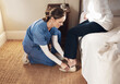 © Malambo/peopleimages.com - Home, shoes and nurse helping woman in bedroom for getting ready with medical checkup in morning. Assistance, healthcare and caregiver with patient for dressing in bedroom of nursing facility.