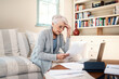 © Malambo/peopleimages.com - Old woman, stress and paper for finance in home, laptop and online mistake for payment. Female person, asset management and website to review mortgage interest, frustrated and insurance form fail