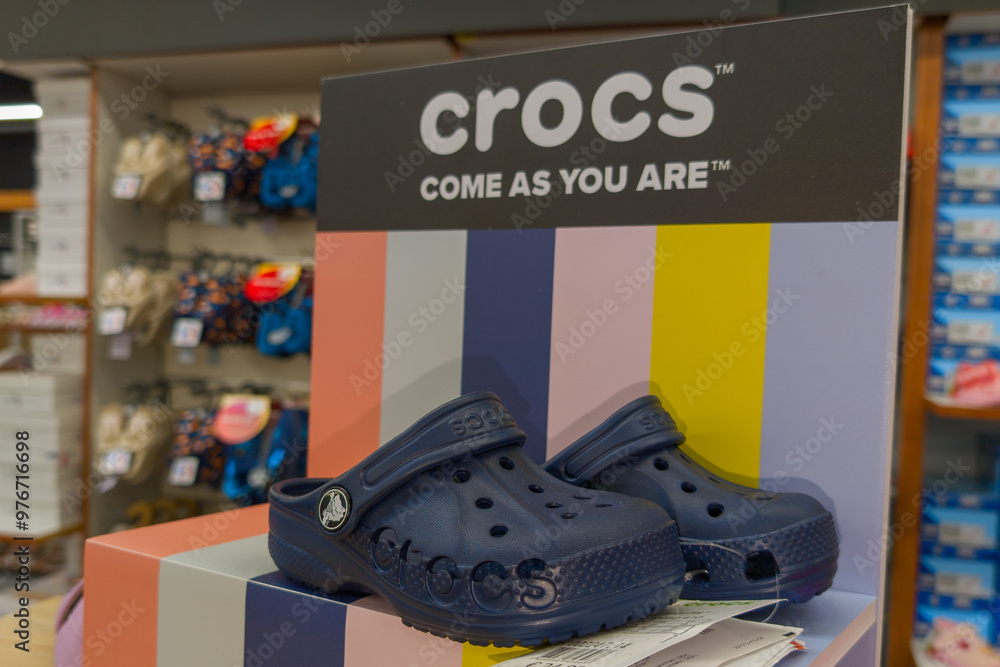 crocs display text sign and logo brand front of American footwear ...