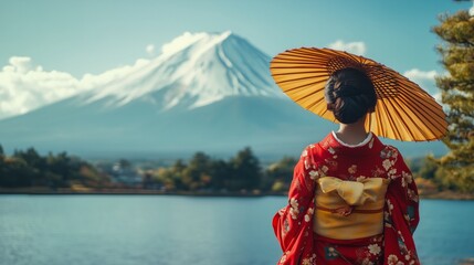 Asian woman wearing japanese traditional kimono at Fuji mountain, Kawaguchiko lake in Japan.