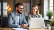 © PREM - Happy professional business man and woman working on laptop at office meeting, two busy colleagues working together having conversation on project, discussing business plan at office