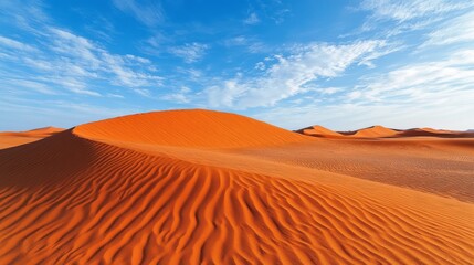 Poster - Golden sand dunes extend infinitely under a bright blue sky, highlighting the grandeur of nature. The intricate patterns in the dunes create depth and intrigue in this vast landscape