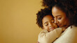 © Kunut - A warm embrace between parent and child, showcasing love and connection against soft yellow background.