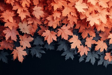 Wall Mural - A black background with a large number of orange and black leaves. The leaves are arranged in a way that they look like they are falling from a tree. The image has a warm and cozy feeling