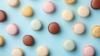 © Nas - Colorful Macarons on a Blue Background