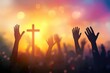 © DailyStock - Silhouette of Hands Raised in Worship with Cross and Sunset. Colorful Easter Sunday Concept