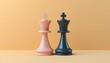 © Sirinan - Two stylish chess king pieces in pink and black, set against a warm orange background, perfect for strategy or game-themed projects.