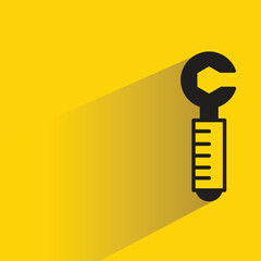 Sticker - wrench tool icon with shadow on yellow background