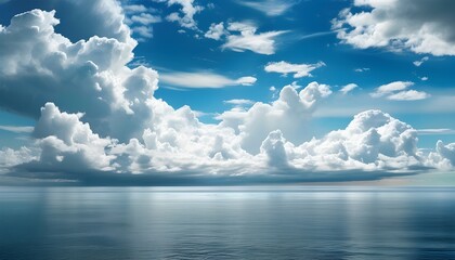 cinematic cloud-filled sky framing a tranquil seascape at the horizon over shimmering water