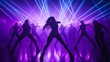 © Thanthara - Silhouetted dancers move energetically in a club, illuminated by dramatic purple and blue lights, creating an electrifying atmosphere.
