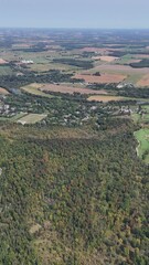 Wall Mural - Aerial footage of a small rural village near to the Grand River on a sunny day in Kitchener, Canada