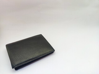 Black men's leather wallet isolated on white background.