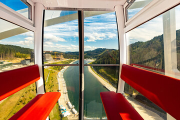 Ferris wheel, view from the cabin at a height with a beautiful view.