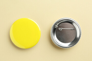 Canvas Print - Button badges on beige background, flat lay. Mockup for design