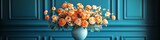 Elegant floral arrangement bouquet with orange and peach ranunculus against a teal background, perfect for spring events, weddings, and celebrations.