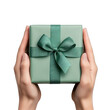 © BoOm - A beautiful green gift box held by hands, perfect for celebrations and special occasions. transparent background