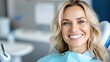 © Pinklife - A cheerful woman sits in a dental chair, showing off her bright smile, while in a modern dental clinic environment preparing for a routine checkup.