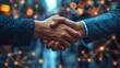 © Александр Лобач - A business handshake between two people . Trust, handshake and business people in the office to make a deal. Partnership, teamwork and handshake for coordination