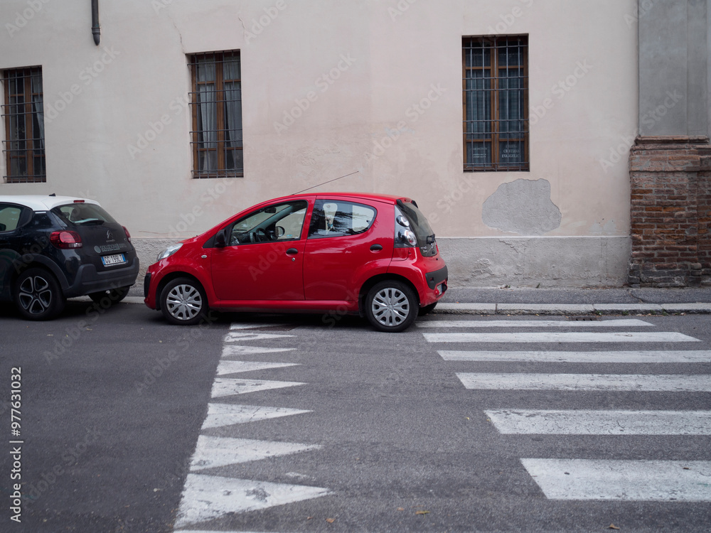 Red car parked illegally blocking pedestrian crossing Stock Photo ...