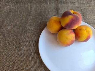 Peaches on a plate. high quality photos