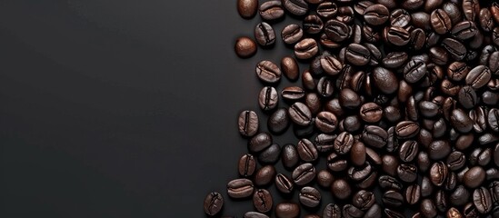 Wall Mural - Close up of roasted dark coffee beans. Copy space image. Place for adding text and design