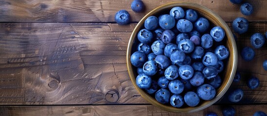 Sticker - Belgian waffles topped with blueberries on a wooden table Breakfast item. Copy space image. Place for adding text and design