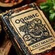 © video rost - An old, vintage book with intricate steampunk gear designs on the cover and an 'Organic' label, positioned against a rustic background. Perfect for themes of history, literature, or steampunk culture.