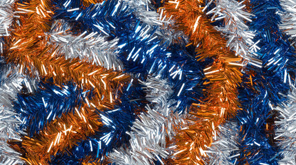 shimmering tinsel garland texture with a blend of metallic cobalt blue, orange and white strands