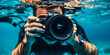 © Aigo labs - A close-up of a photographer underwater, capturing the beauty of the ocean.