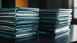 © Arceli - Business folders stacked neatly on a glass office table