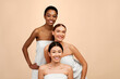© Prostock-studio - Three Multicultural Women In Bath Towels Posing In Studio On White Background. Female Group Beauty Portrait