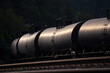 © Hrach - Black tank cars cisterns for gas and oil, captured in Portland, Oregon industrial area. High quality close up picture for download.