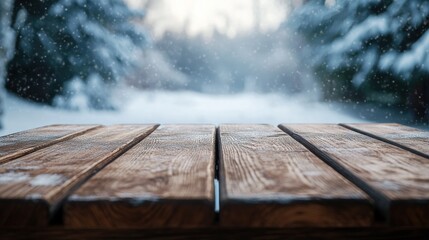 Poster - A snowy landscape with a wooden table in the foreground, creating a serene winter atmosphere.