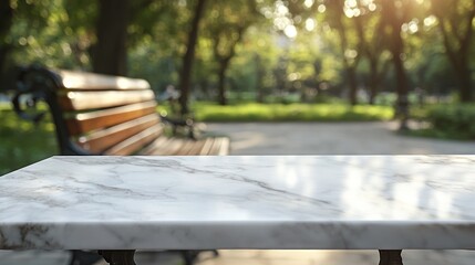 Poster - A marble table in a serene park setting with a blurred bench and sunlight filtering through trees.