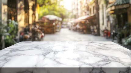 Canvas Print - A blurred street scene with a marble table in the foreground, suggesting a café setting.