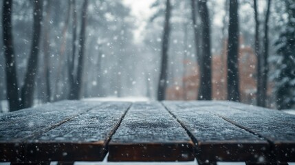 Poster - A snowy scene featuring a wooden table in a tranquil winter forest.